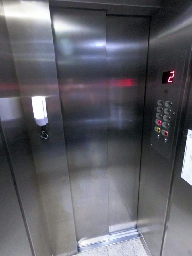 Sala living em prédio Familiar na Av da Praia Santos  Exterior foto